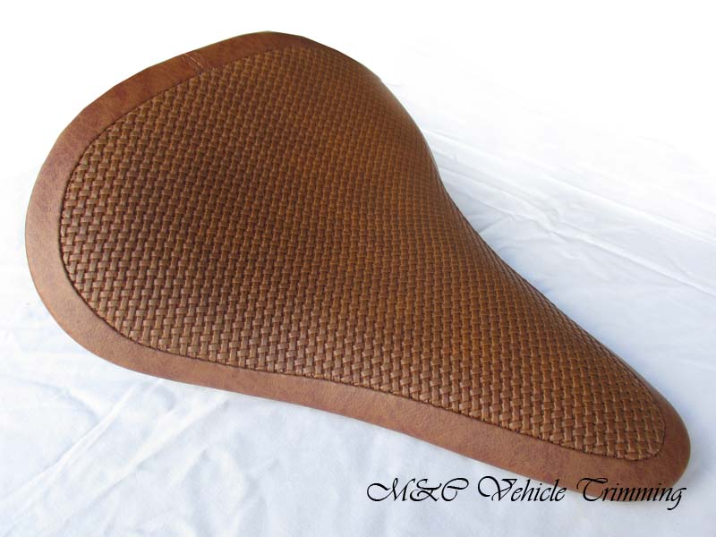 Customized motorbike seat with brown vinyl
